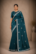Elegant Teal Embroidered Designer Saree with Silver Floral Border