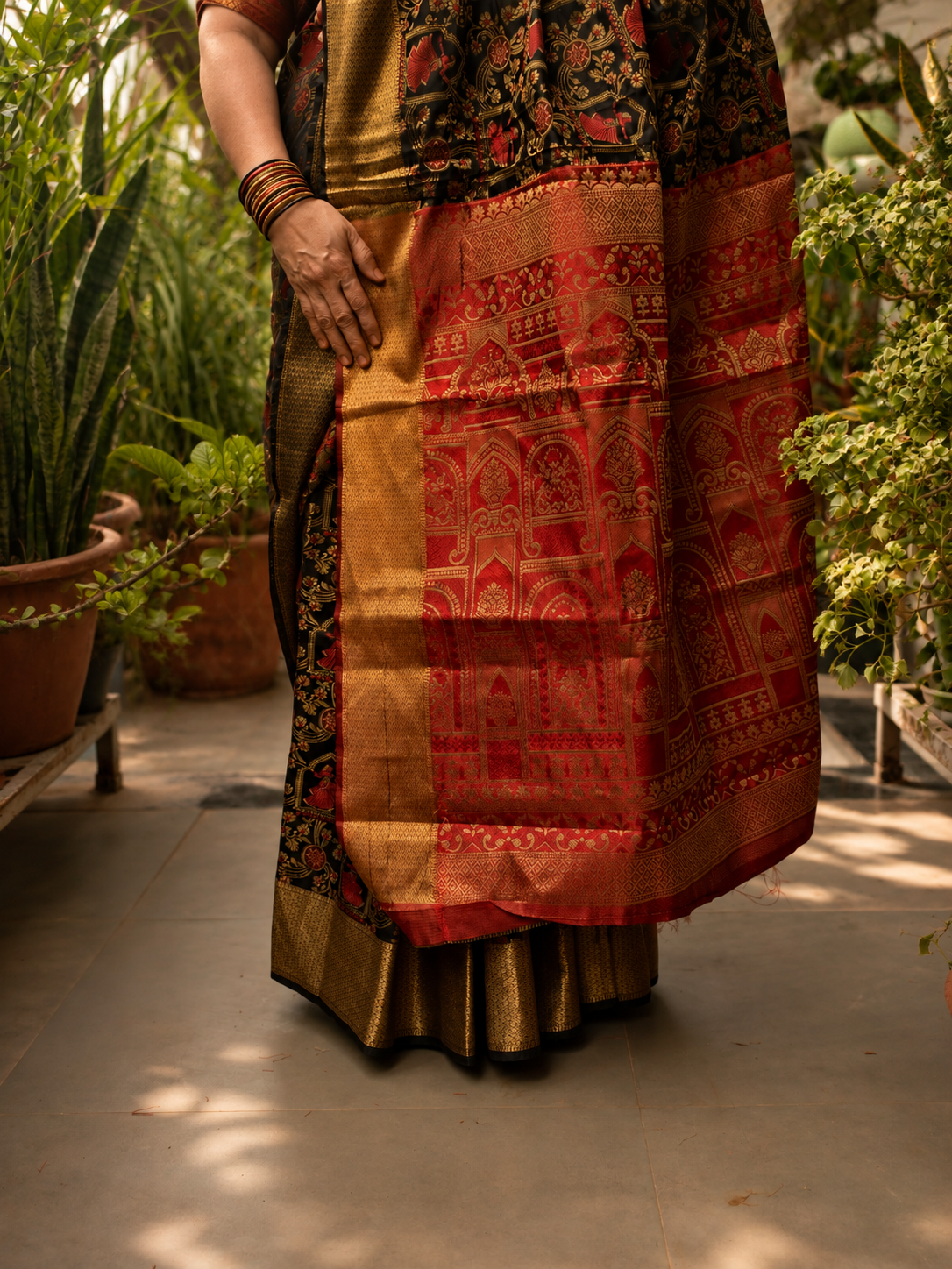 Regal Black & Maroon Printed Saree with Gold Zari Border